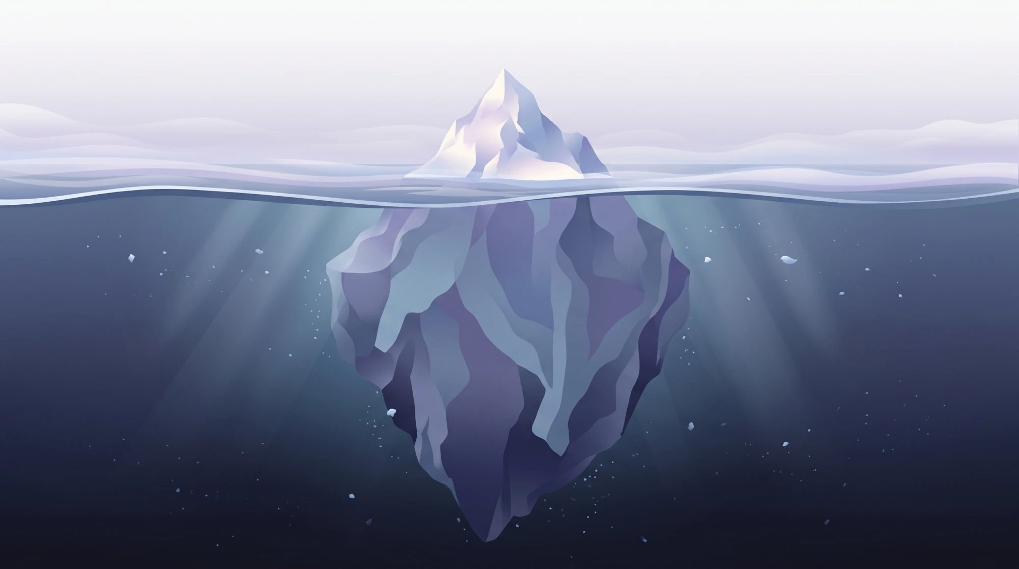 An iceberg: a small tip above the waterline and a far larger mass beneath it